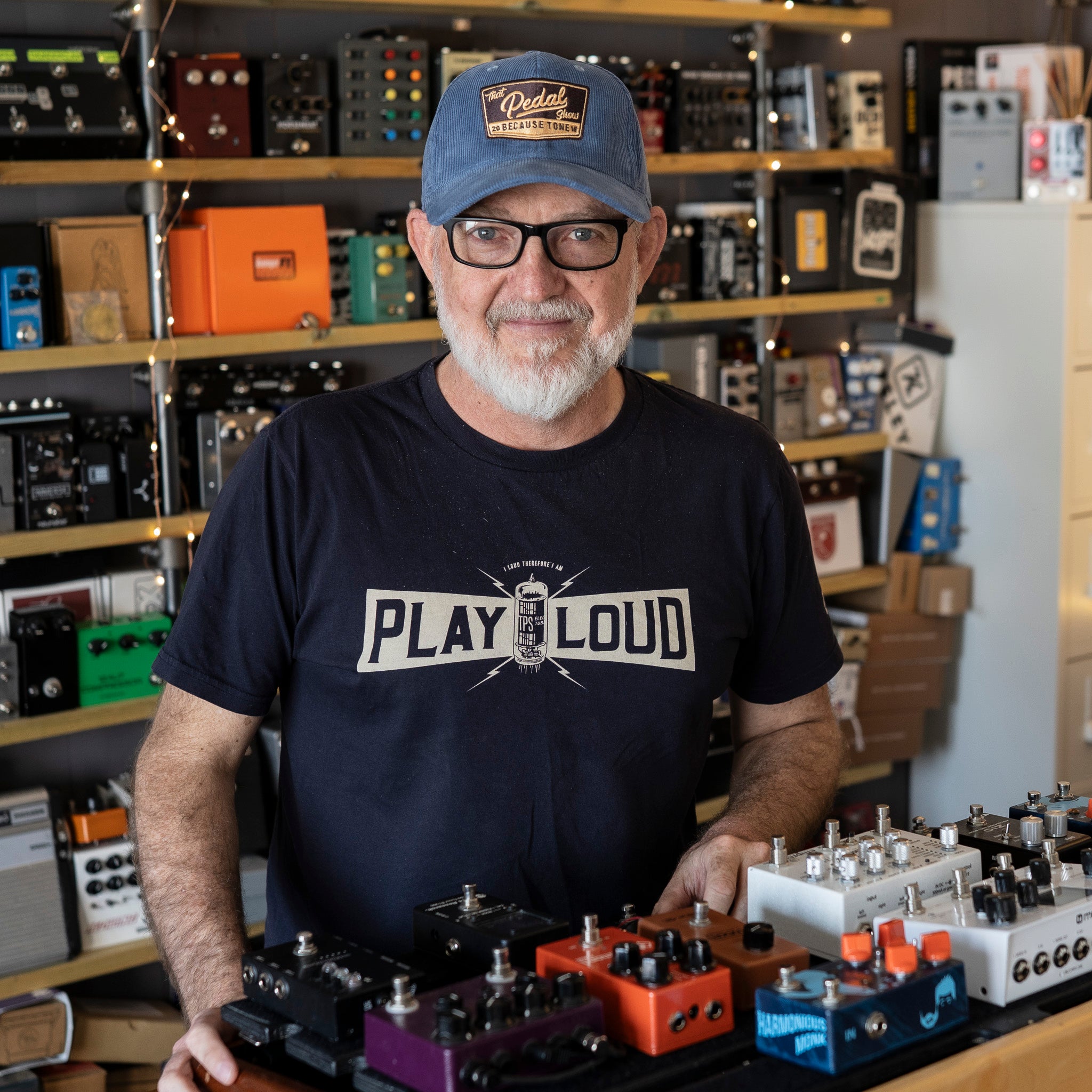 Dan wears Slate Blue corduroy baseball cap with vintage That Pedal Show logo embroidered onto front.