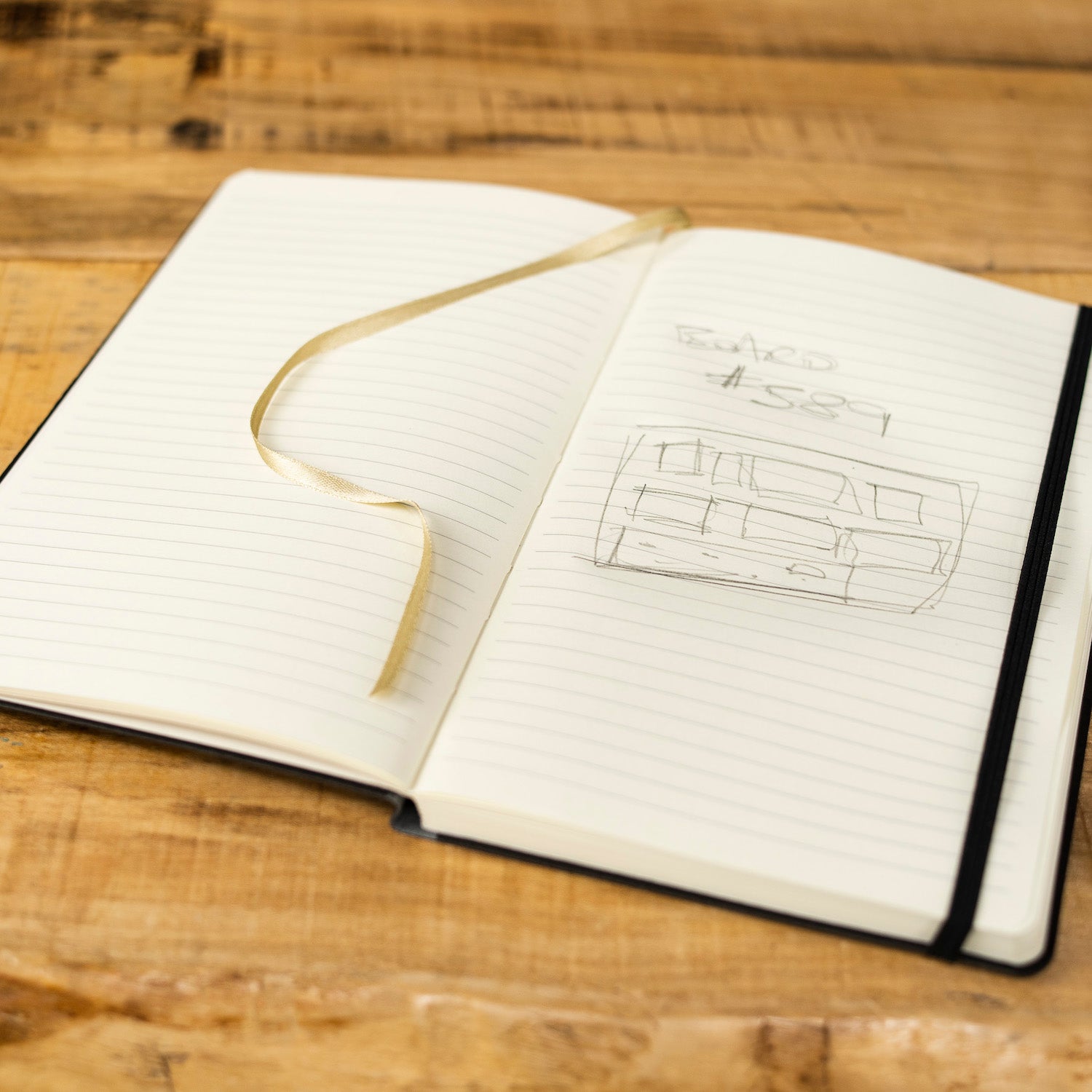 Pedalboard sketch in a notebook
