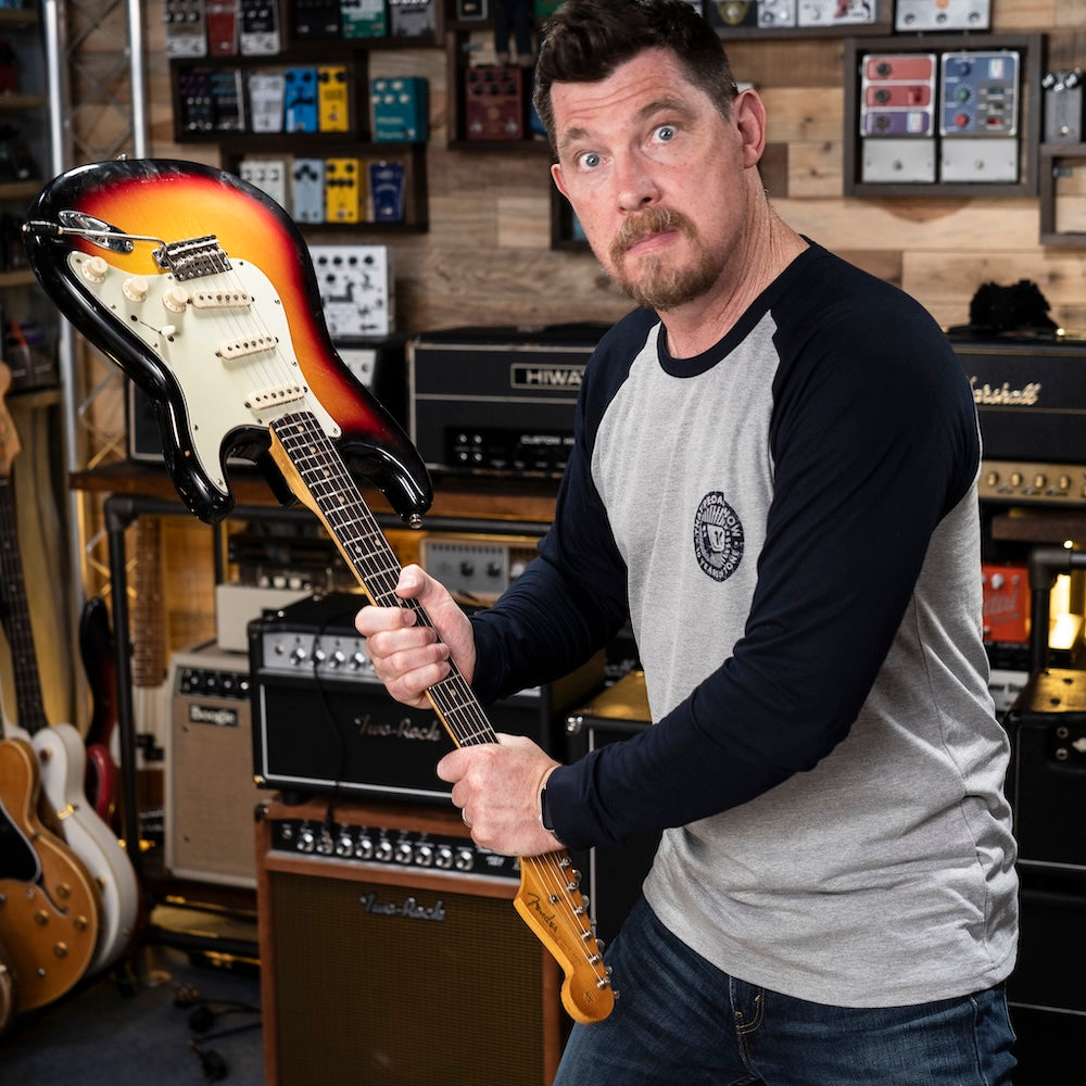 Mick wears That Pedal Show 10 Year Anniversary Baseball Tee