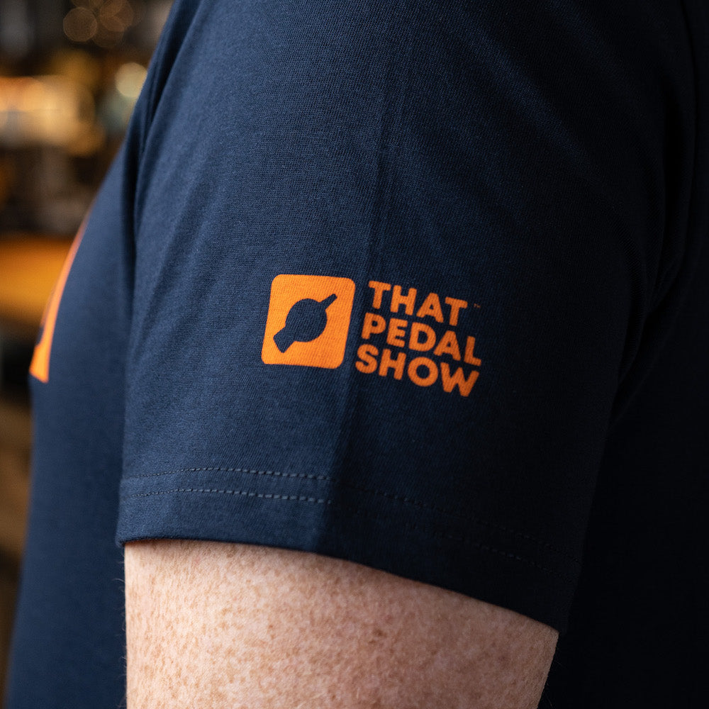 That Pedal Show logo printed onto the sleeve of a TPS t-shirt