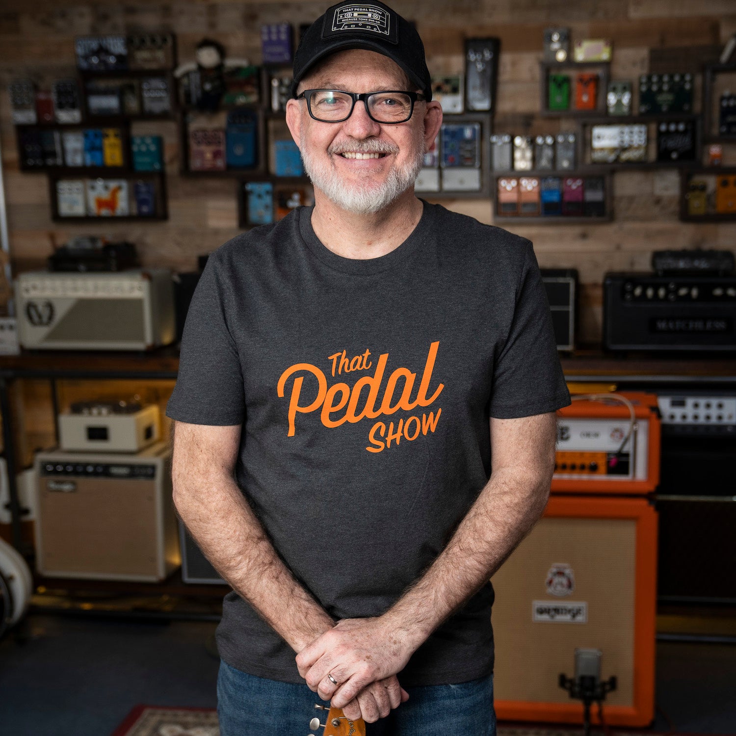 Dan wearing a 'That Pedal Show' vintage logo t-shirt in the TPS Studio